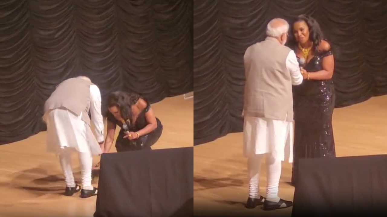 Mary Millben Touches PM Modi's Feet