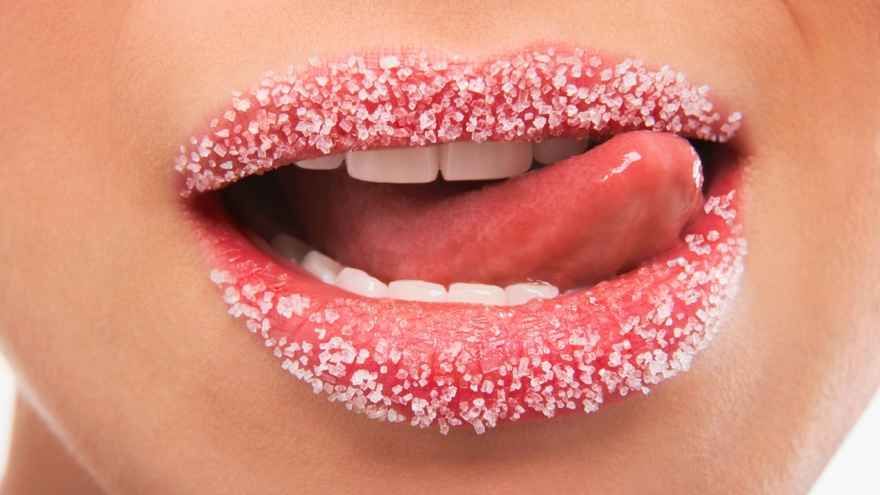 Tongue Licking Lips Covered In Sugar