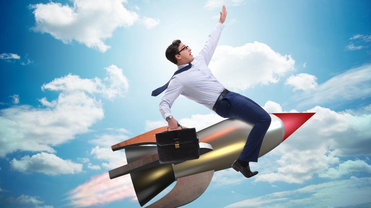 Businessman Flying On Rocket