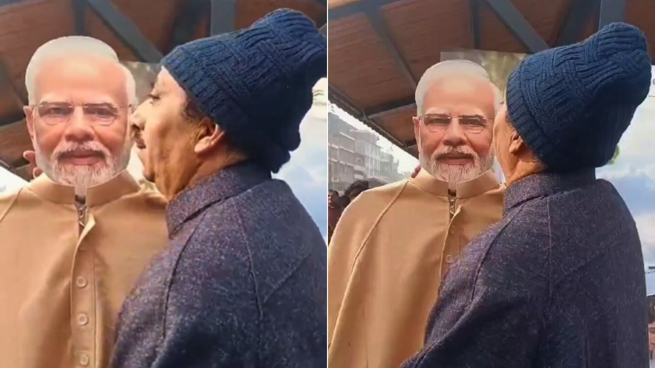Kashmiri Man Kisses PM Modi Cutout Statue